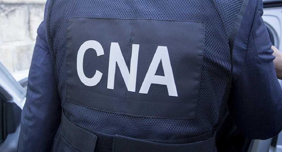 Un bărbat, reținut de CNA pentru acte de corupție. Ar fi facilitat transferul a 60 de mii de dolari pentru coruperea unor funcționari